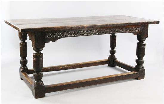 A 17th century style oak refectory table, 6ft 2in. x 2ft 7in. x 2ft 7.5in.